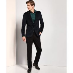 SPODNIE DŁUGIE MĘSKIE CHINOSY, KLASYCZNE. Eleganckie spodnie marki TOP SECRET. W wyprzedaży za 49.99 zł.