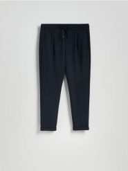 Spodnie jogger z wiązaniem w pasie - granatowy. Niebieskie joggery i bojówki Reserved, l, bez wzorów, z bawełny. Za 119.99 zł.