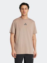 Adidas Koszulka sportowa w kolorze beżowym rozmiar: S. Brązowe t-shirty sportowe Adidas, bez wzorów, z materiału, bez ramiączek, outdoorowe. Za 102.42 zł.