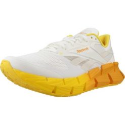 Buty REEBOK FLOATZIG 1 Biały. Białe buty turystyczne Reebok, bez wzorów, z syntetyku, bez zapięcia, trekkingowe. Za 411.99 zł.