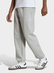 Adidas Spodnie dresowe w kolorze szarym rozmiar: L. Szare spodnie treningowe długie Adidas, l, bez wzorów, z dresówki. Za 159.95 zł.