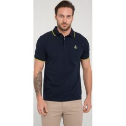 Koszulka polo "Radius" - Regular fit - w kolorze granatowo-jasnozielonym. Koszulki polo marki Sir Raymond Taylor, z haftami, z bawełny, polo, z krótkim rękawem. W wyprzedaży za 78.95 zł.