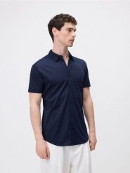 Koszula super slim z merceryzowanej bawełny - granatowy. Niebieskie koszule Reserved, l, bez wzorów, z bawełny, bez kołnierzyka, bez ramiączek. Za 129.99 zł.