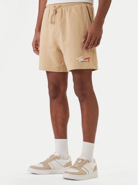Tommy Jeans Szorty sportowe Signature DM0DM23017 Beżowy Regular Fit. Brązowe krótkie spodenki sportowe Tommy Jeans, m, bez wzorów, z bawełny. Za 249.99 zł.