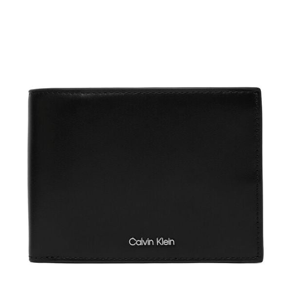 Portfel Calvin Klein. Czarne portfele CALVIN KLEIN, bez wzorów. Za 369.99 zł.
