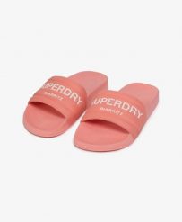 Superdry klapki Destination Pool z wyściełanym paskiem – Peach Amber Pink. Czerwone klapki Superdry, z poliesteru. Za 152.50 zł.