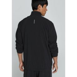 Męska kurtka do biegania VELOCITY PUMA Black. Czarne kurtki Puma, m, bez wzorów, bez kaptura, do biegania. Za 269.00 zł.