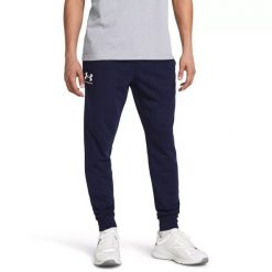Under Armour UA RIVAL TERRY JOGGER Spodnie dresowe męskie. Niebieskie joggery i bojówki Under Armour, l, bez wzorów, z dresówki, klasyczne. Za 269.00 zł.