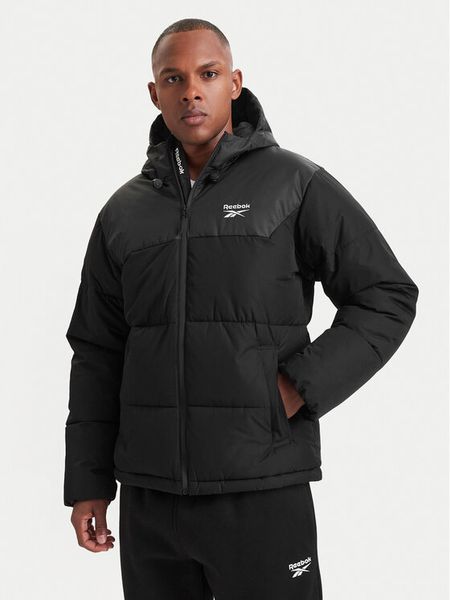 Reebok Kurtka zimowa RCC00084 Czarny Regular Fit. Czarne kurtki Reebok, na zimę, m, bez wzorów, z syntetyku, bez kaptura. Za 399.99 zł.
