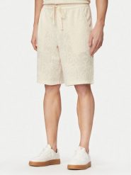 Guess Szorty sportowe F6GD03 kremKG362 Kremowy Regular Fit. Białe krótkie spodenki sportowe Guess, m, z aplikacjami, z bawełny. Za 264.99 zł.