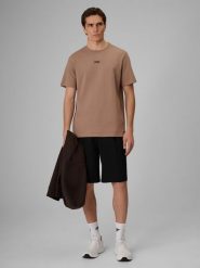 4F Spodenki tkaninowe męskie 4F x Robert Lewandowski - czarne L. Czarne krótkie spodenki sportowe 4F, l, bez wzorów, z dresówki. Za 169.99 zł.