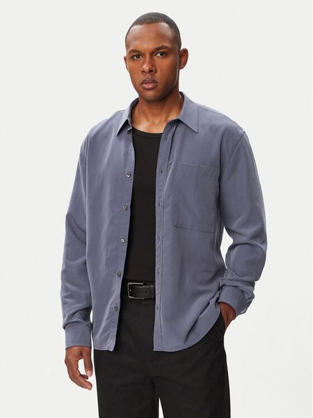 Calvin Klein Koszula Ls Drapey LV04LF113G Fioletowy Regular Fit. Fioletowe koszule CALVIN KLEIN, m, bez wzorów, z syntetyku, bez kołnierzyka, bez ramiączek. Za 449.99 zł.