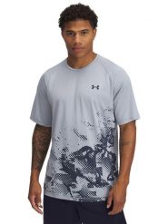 Under Armour Koszulka sportowa w kolorze błękitno-granatowym rozmiar: XL. Niebieskie t-shirty sportowe Under Armour, bez wzorów, bez ramiączek, outdoorowe. Za 110.55 zł.