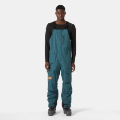 Spodnie narciarskie z szelkami i kieszenią cargo Helly Hansen Sogn. Zielone spodnie narciarskie i snowboardowe Helly Hansen, m, bez wzorów, narciarskie. Za 1,037.00 zł.