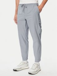 BOSS Spodnie cargo T_Urbanex-CargoLight 50508339 Szary ciemny Tapered Fit. Szare spodnie materiałowe Boss, m, bez wzorów, z materiału. Za 699.99 zł.