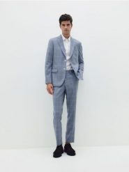 Spodnie garniturowe slim fit - niebieski. Niebieskie garnitury Reserved, bez wzorów, z tkaniny. W wyprzedaży za 69.99 zł.