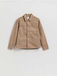 Jeansowa koszula comfort fit - brązowy. Brązowe koszule Reserved, l, bez wzorów, z bawełny, bez kołnierzyka, bez ramiączek. W wyprzedaży za 99.99 zł.