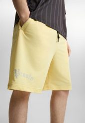 Spodenki sportowe męskie Prosto Nine. Żółte krótkie spodenki sportowe Prosto., m, z aplikacjami, z elastanu. Za 224.99 zł.