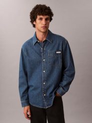 Calvin Klein Jeans koszula dżinsowa Mężczyźni Modern Fit Bawełna niebieski, L. Niebieskie koszule Calvin Klein Jeans, l, bez wzorów, z bawełny, bez kołnierzyka, bez ramiączek. Za 329.95 zł.