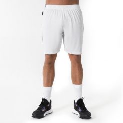 Spodenki do koszykówki unisex Short 100. Białe szorty KIPSTA, m, bez wzorów, z materiału, sportowe. Za 29.99 zł.
