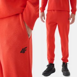 SPODNIE DRESOWE MĘSKIE 4F JOGGERY DRESY SPORTOWE POMARAŃCZOWE. Brązowe joggery i bojówki 4F, l, bez wzorów, z bawełny, sportowe. Za 149.99 zł.