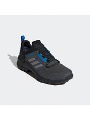 Adidas Buty turystyczne "Terrex Swift R3 GTX" w kolorze antracytowo-niebieskim rozmiar: 44. Czarne botki sznurowane Adidas, bez wzorów, z gore-texu, bez obcasa, bez zapięcia. Za 537.45 zł.