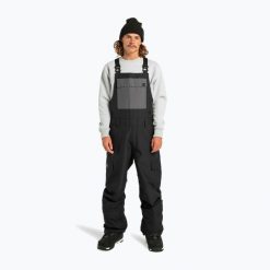 Spodnie snowboardowe męskie DC Docile Bib. Czarne spodnie narciarskie i snowboardowe DC Shoes, m, bez wzorów, narciarskie. Za 609.99 zł.