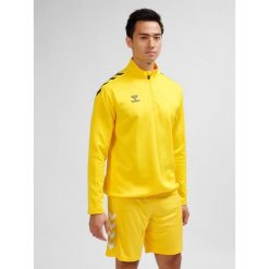 Bluza 1/2 zip Hummel Core XK. Brązowe bluzy bez kaptura Hummel, bez wzorów, z elastanu, bez kaptura. Za 187.15 zł.