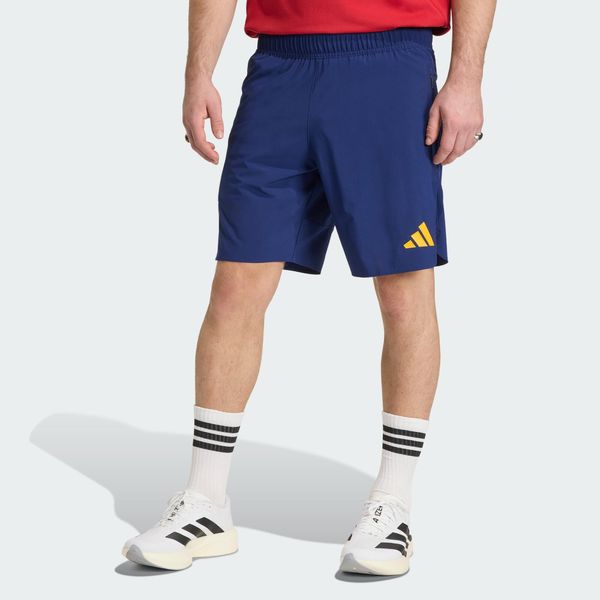 Szorty Hiszpania Tiro Travel. Niebieskie szorty Adidas, bez wzorów, sportowe. Za 219.00 zł.