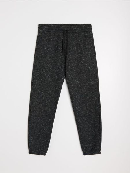 Spodnie dresowe regular jogger - szary. Szare joggery i bojówki Sinsay, l, bez wzorów, z dresówki. W wyprzedaży za 24.99 zł.
