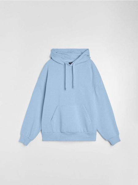 Bluza z kapturem comfort fit z domieszką bawełny - niebieski. Niebieskie bluzy z kapturem Sinsay, l, bez wzorów, z bawełny, z kapturem. Za 39.99 zł.