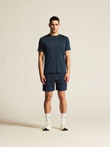 Craft Koszulka sportowa "Collective" w kolorze granatowym rozmiar: S. Niebieskie t-shirty sportowe Craft, bez wzorów, z materiału, bez ramiączek, outdoorowe. Za 85.38 zł.