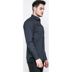 G-Star Raw - Koszula. Niebieskie koszule G-Star Raw, xl, bez wzorów, z bawełny, bez kołnierzyka, bez ramiączek. W wyprzedaży za 149.90 zł.