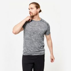 Koszulka fitness męska Domyos krótki rękaw. Fioletowe bluzki z długim rękawem DOMYOS, m, bez wzorów, z materiału, bez kołnierzyka, bez ramiączek. Za 24.99 zł.