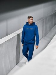 4F Bluza dresowa regular z kapturem męska 4F x Robert Lewandowski - granatowa XXL. Niebieskie bluzy 4F, m, bez wzorów, z bawełny, z kapturem. Za 199.99 zł.