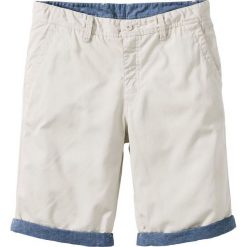 Bermudy chino z wywiniętymi nogawkami Regular Fit bonprix naturalny. Eleganckie spodnie marki Under Armour. Za 37.99 zł.