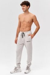 Męskie spodnie dresowe sportowe Rough Radical Cotton Active Joggers. Szare joggery i bojówki ROUGH RADICAL, l, bez wzorów, z bawełny, eleganckie. Za 135.90 zł.
