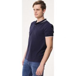 Granatowa Koszulka Exchangeability. Bezrękawniki marki Born2be. Za 49.99 zł.