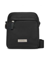 Calvin Klein Saszetka Sleek Reporter LV04D3180G Czarny. Czarne torby na ramię CALVIN KLEIN, bez wzorów, z materiału, bez dodatków. Za 299.99 zł.