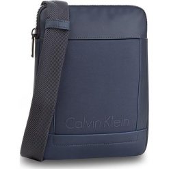 Saszetka CALVIN KLEIN - Caillou Flat Crosso K50K502835 422. Saszetki i nerki marki CALVIN KLEIN. W wyprzedaży za 239.00 zł.