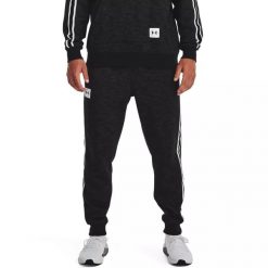 Spodnie dresowe męskie Under Armour Essential Heritage Fleece Jogger. Niebieskie joggery i bojówki Under Armour, m, bez wzorów, z dresówki, sportowe. Za 169.99 zł.