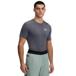Koszulka Under Armour HeatGear. Białe odzież kompresyjna Under Armour, xl, bez wzorów, z materiału, do biegania. Za 161.70 zł.