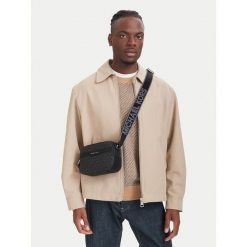 Saszetka MICHAEL Michael Kors. Czarne saszetki i nerki MICHAEL Michael Kors, bez wzorów. Za 899.99 zł.