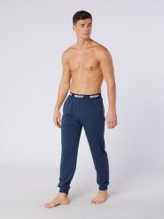 DKNY Spodnie dresowe w kolorze granatowym rozmiar: L. Niebieskie spodnie treningowe długie DKNY, l, bez wzorów, z bawełny. Za 101.23 zł.