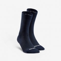 Skarpety turystyczne Quechua SH100 Mid. Niebieskie skarpety QUECHUA, bez wzorów, z elastanu. Za 39.99 zł.
