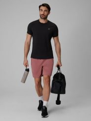 4F Spodenki treningowe szybkoschnące męskie - koralowe XL. Pomarańczowe krótkie spodenki sportowe 4F, l, bez wzorów, z materiału. Za 149.99 zł.