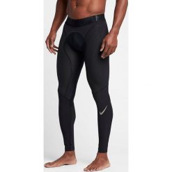 Nike Legginsy Men's Pro Zonal Strength Tight czarny r. M (839487 010). Spodnie treningowe długie marki Nike. Za 286.00 zł.