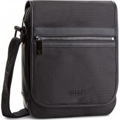 Saszetka GUESS - HM6571 POL84 BLA. Czarne torby na ramię marki Guess, z materiału. Za 329.00 zł.