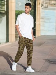 Spodnie jogger - wielobarwny. Joggery i bojówki Sinsay, m, bez wzorów, z bawełny. Za 59.99 zł.