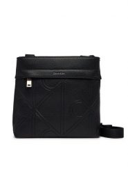 Calvin Klein Saszetka Emblem Emboss Slim Flatpack LV04D3370G Czarny. Czarne torby na ramię CALVIN KLEIN, bez wzorów, ze skóry, bez dodatków. Za 369.99 zł.